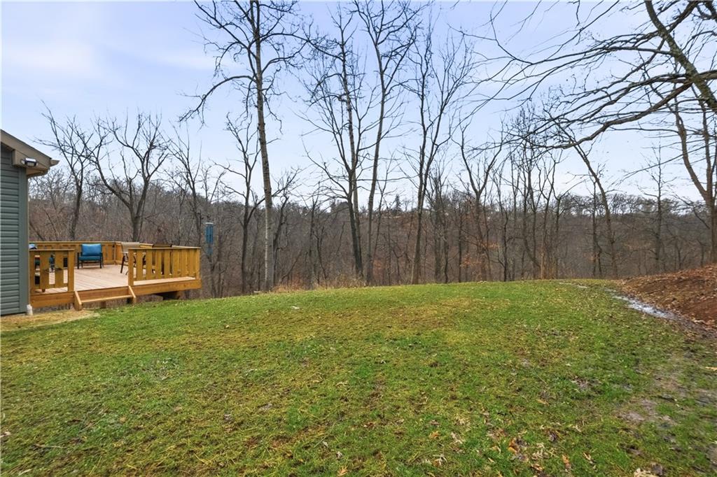 2388 Ridge Road Extension Ambridge, PA 15003 - Photo 40 of 44 a view of a backyard with wooden fence