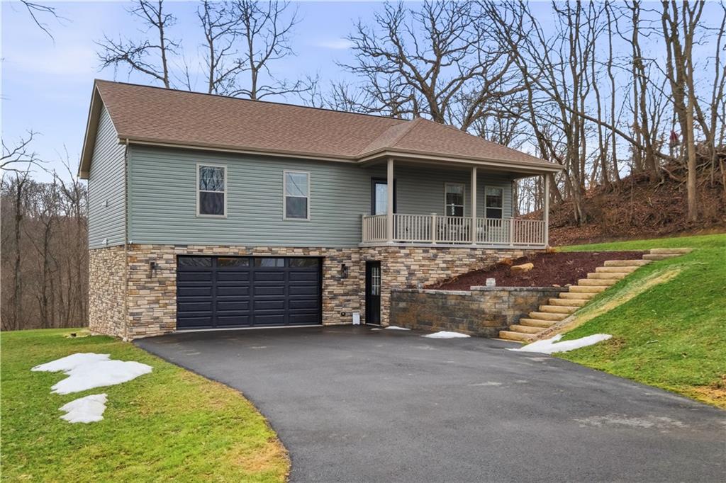 2388 Ridge Road Extension Ambridge, PA 15003 - Photo 42 of 44 a front view of a house with a yard