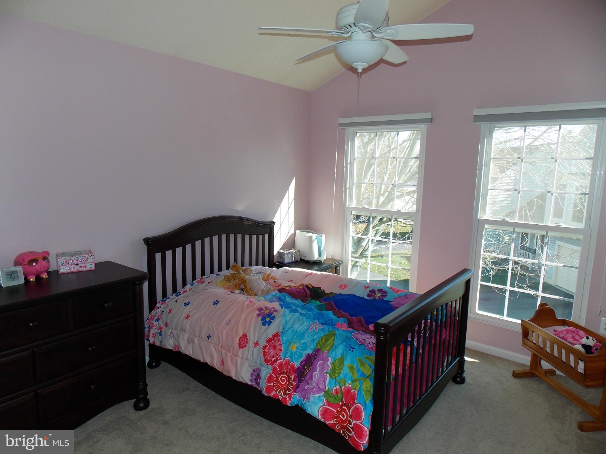 429 Deer Path Avenue Southwest Leesburg, VA 20175 - Photo 21 of 30 a bedroom with a bed and a window