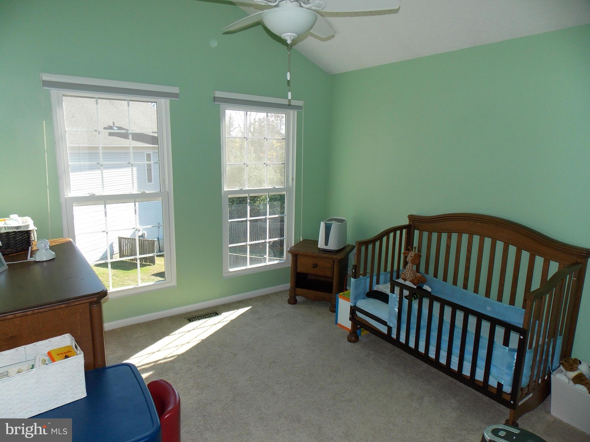 429 Deer Path Avenue Southwest Leesburg, VA 20175 - Photo 22 of 30 a bedroom with furniture and a window