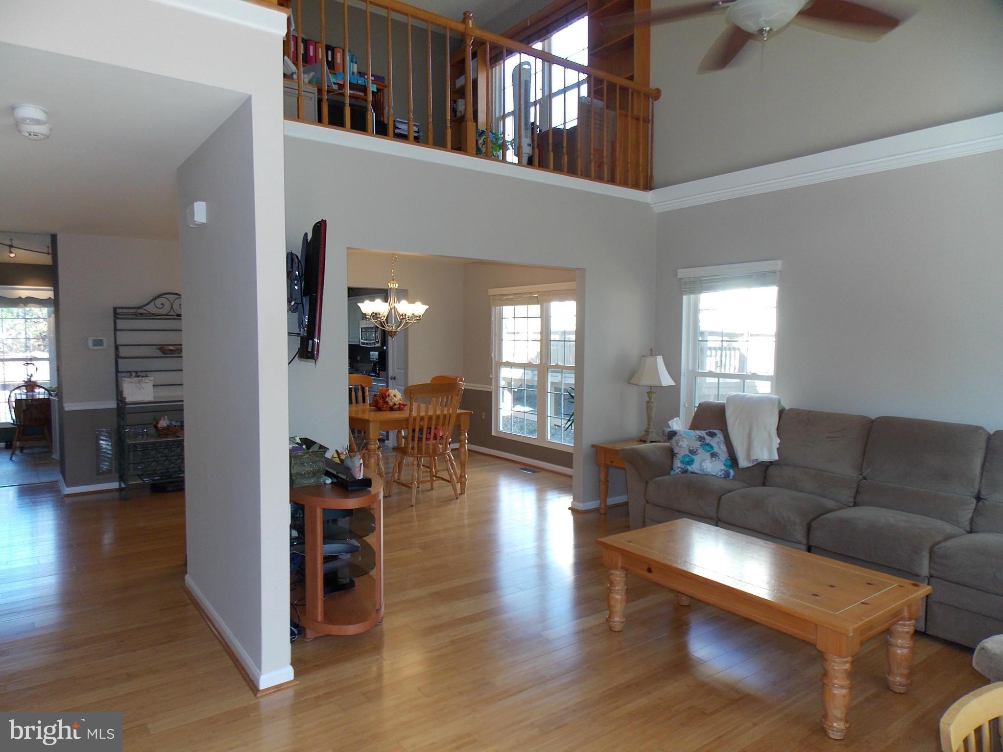 429 Deer Path Avenue Southwest Leesburg, VA 20175 - Photo 4 of 30 a living room with furniture and wooden floor
