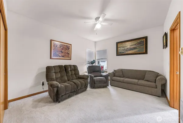a living room with furniture and a couch