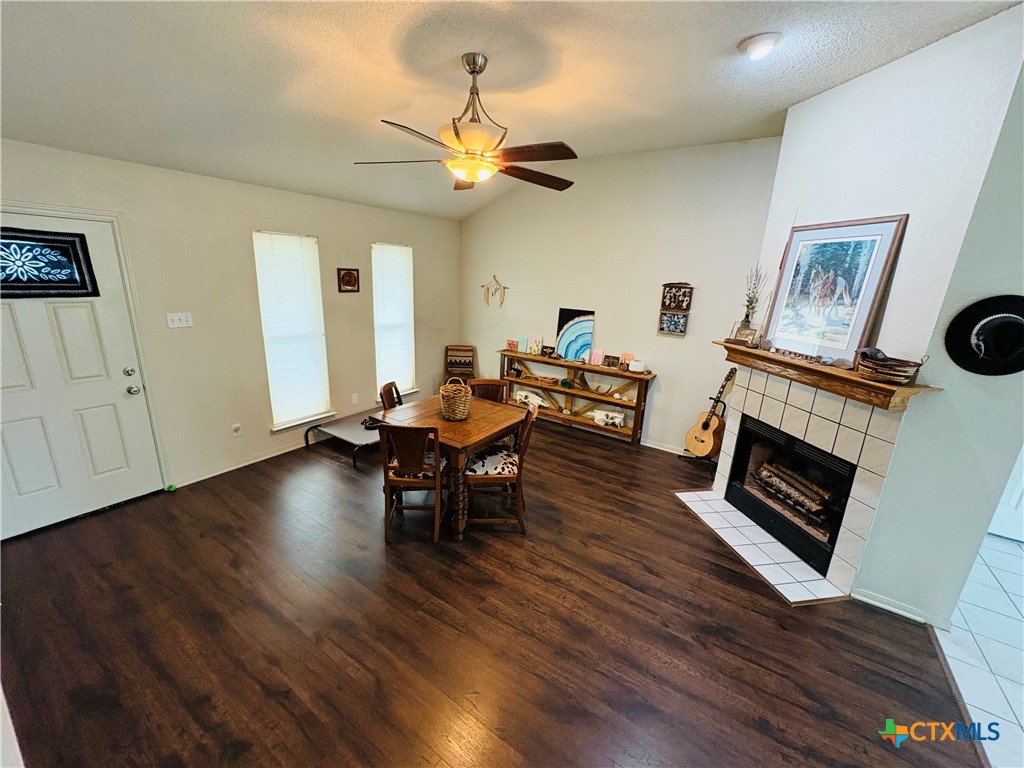 369 County Road 3367 Kempner, TX 76539 - Photo 5 of 18 a living room with fireplace furniture and a wooden floor