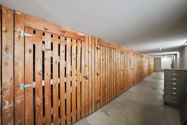 a view of wooden floor with staircase