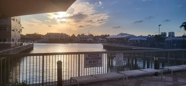 a view of a balcony with wooden floor