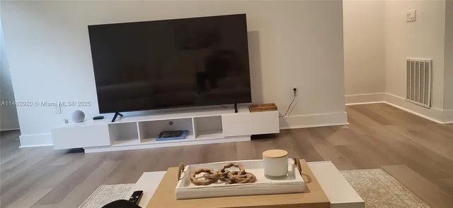 a living room with a couch and a coffee table