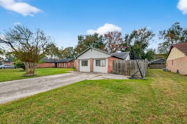 a house view with a garden space