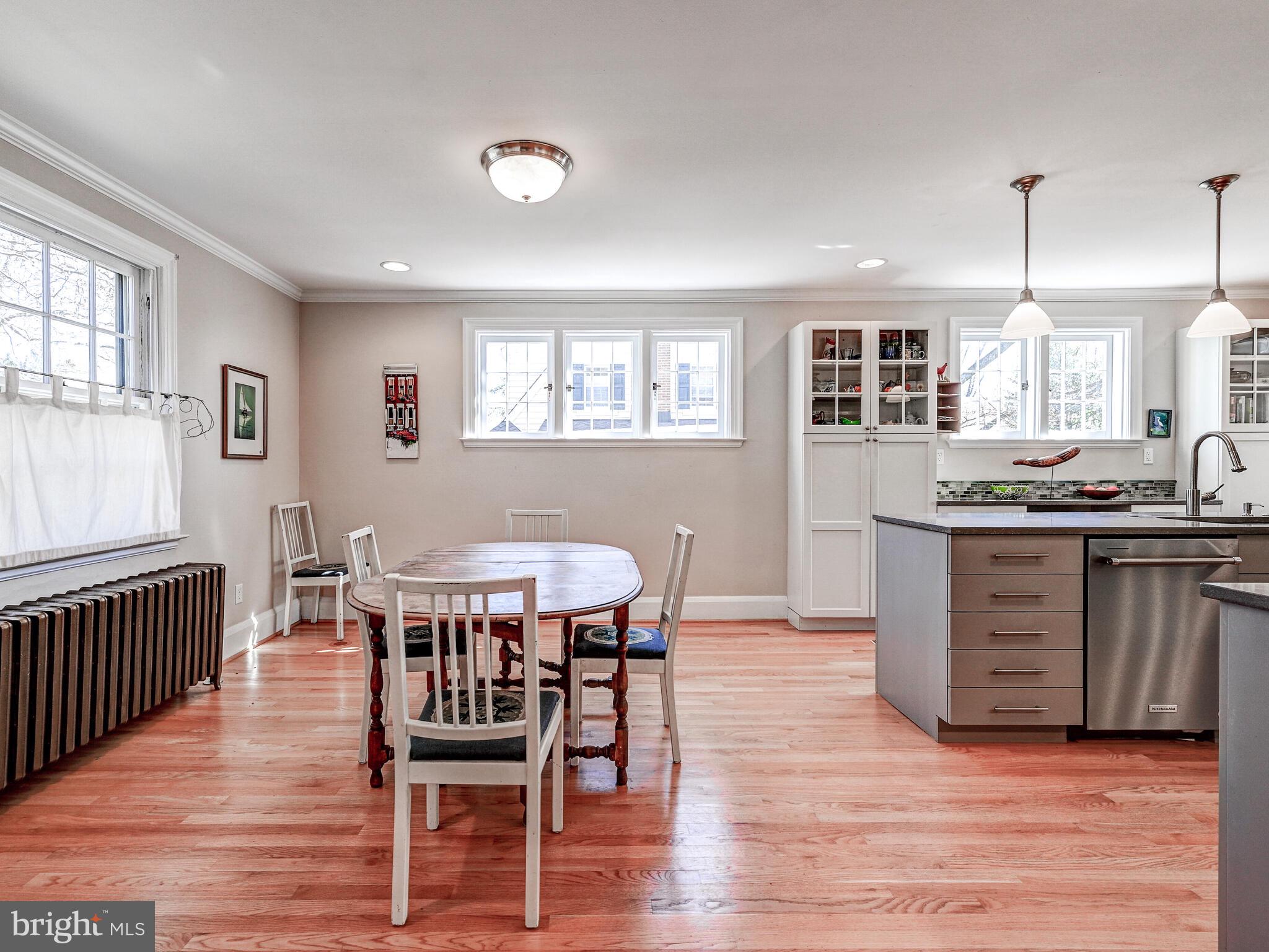 207 Cedarcroft Road Baltimore, MD 21212 - Photo 13 of 50 a view of a dining room with furniture window and wooden floor