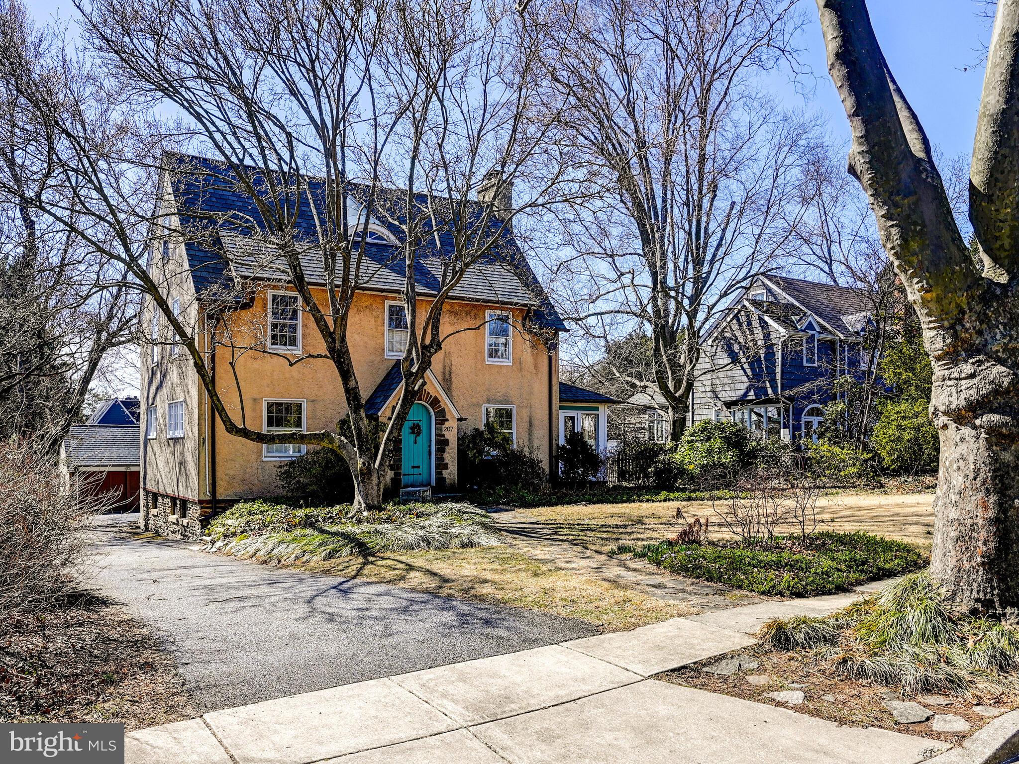 207 Cedarcroft Road Baltimore, MD 21212 - Photo 44 of 50 a view of a white house with a yard covered in snow