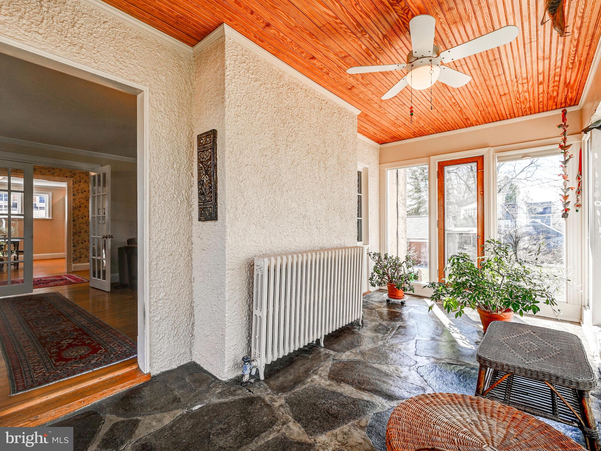 207 Cedarcroft Road Baltimore, MD 21212 - Photo 10 of 50 a balcony with furniture and a potted plant