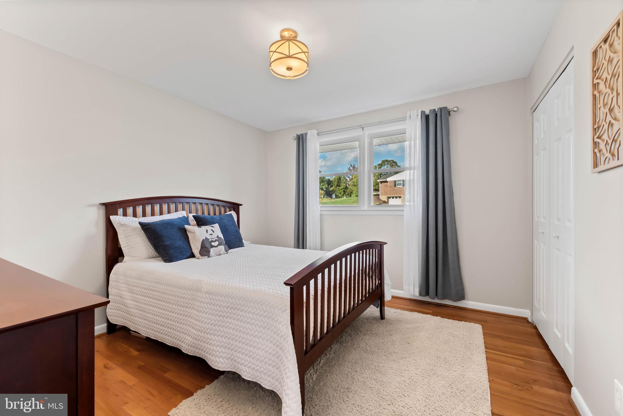 419 Wake Robin Drive Cockeysville, MD 21030 - Photo 14 of 20 a bedroom with a bed and a window