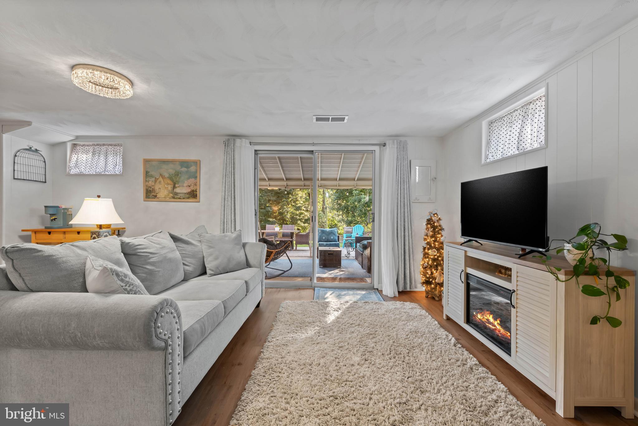 419 Wake Robin Drive Cockeysville, MD 21030 - Photo 17 of 20 a living room with furniture and a flat screen tv