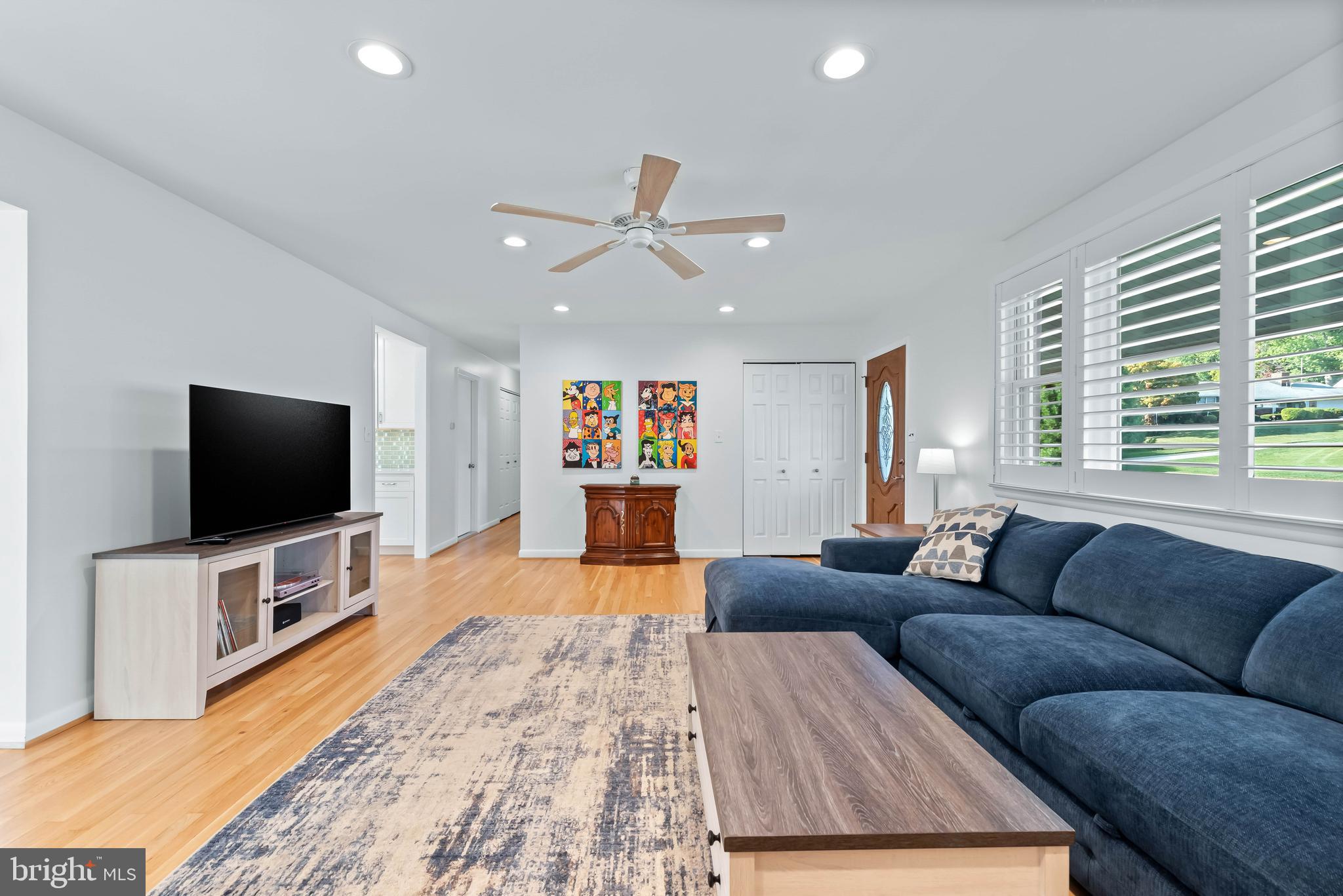 419 Wake Robin Drive Cockeysville, MD 21030 - Photo 5 of 20 a living room with furniture and a flat screen tv