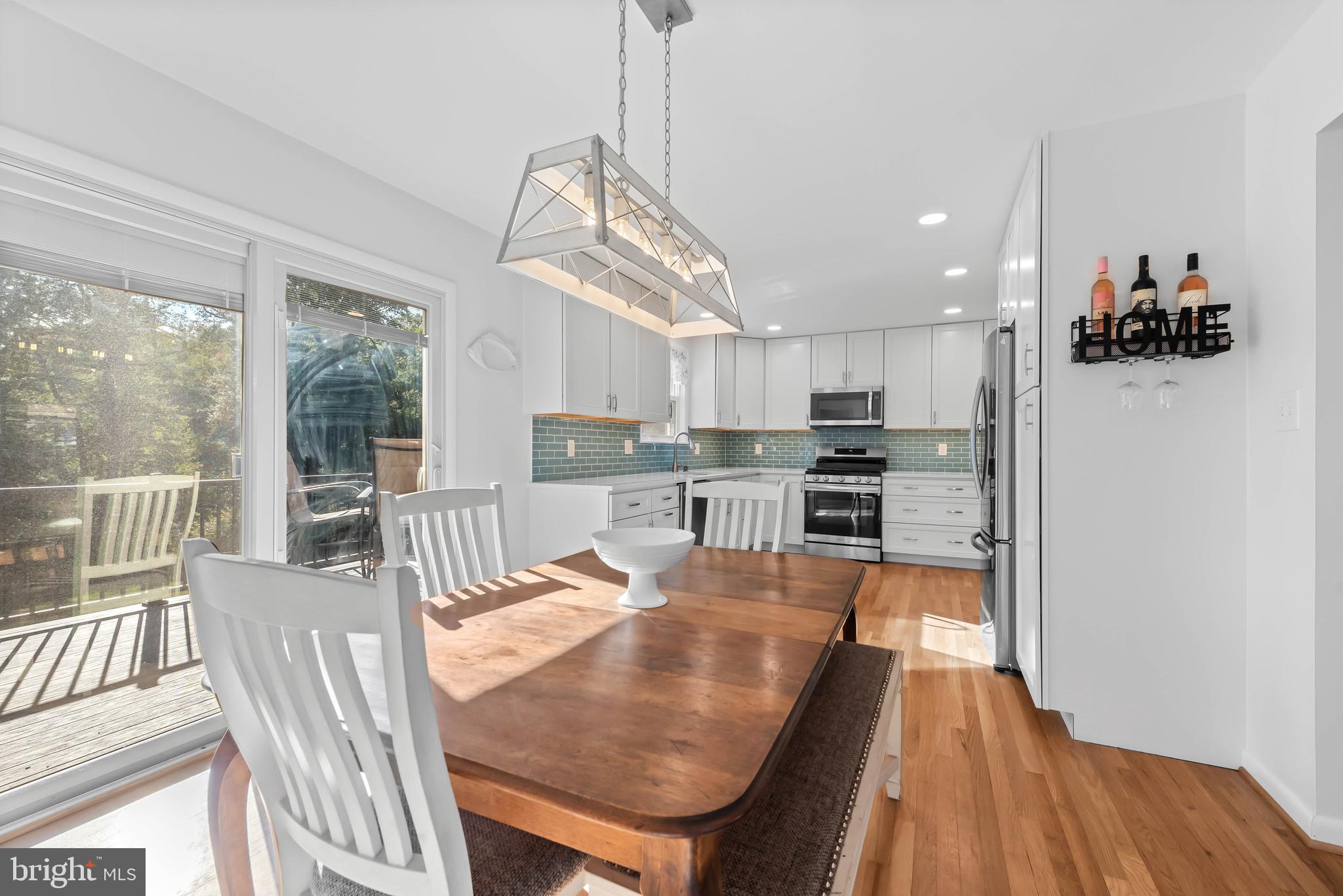419 Wake Robin Drive Cockeysville, MD 21030 - Photo 6 of 20 a kitchen with stainless steel appliances granite countertop lots of counter top space and wooden floor