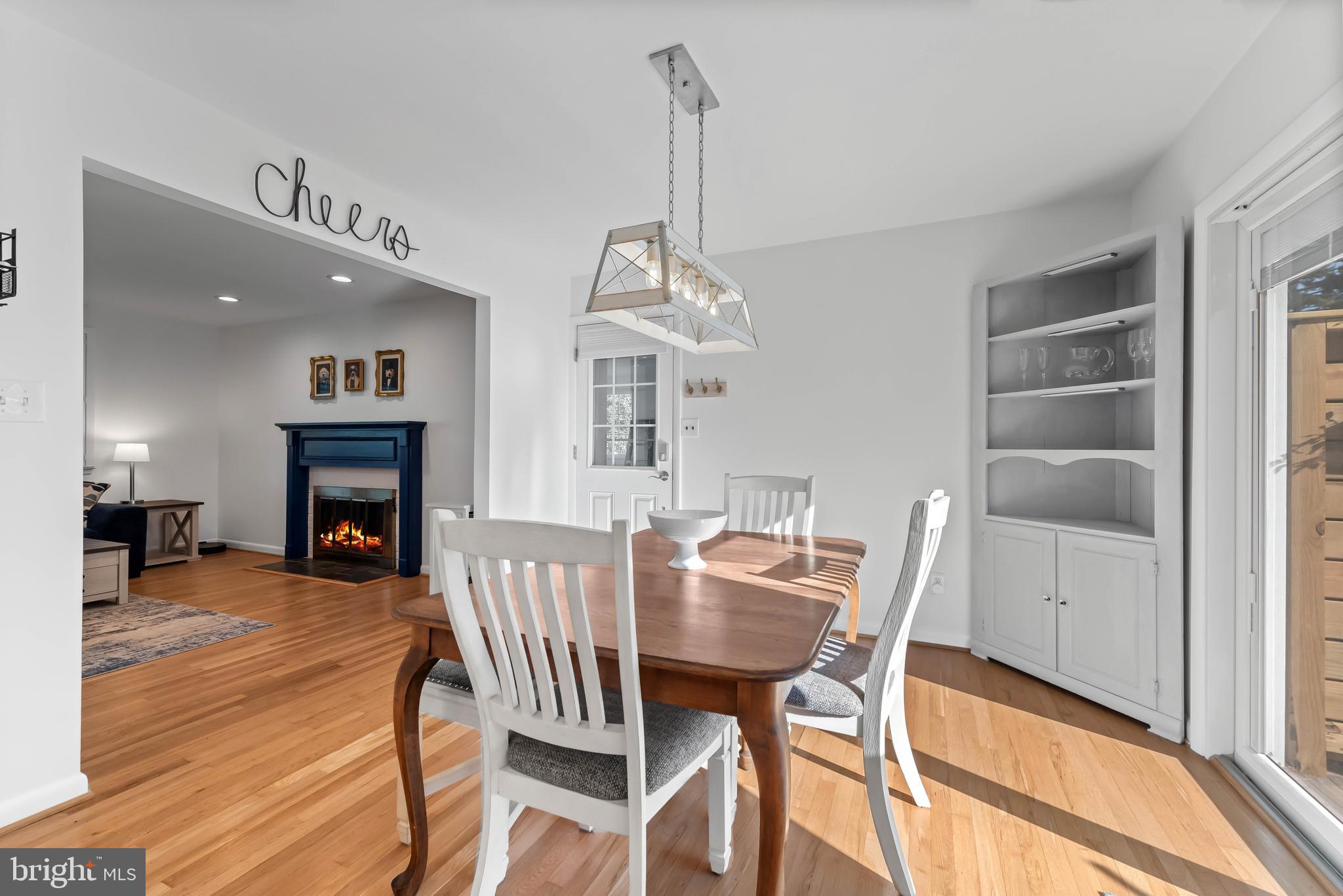 419 Wake Robin Drive Cockeysville, MD 21030 - Photo 9 of 20 a view of a dining room with furniture window and wooden floor