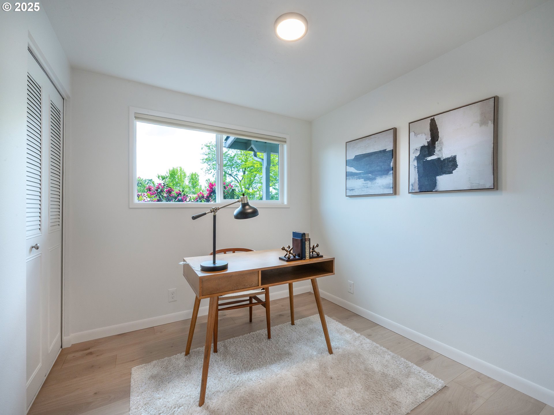 1376 Buck Street Eugene, OR 97402 - Photo 15 of 31 a room with furniture and a potted plant