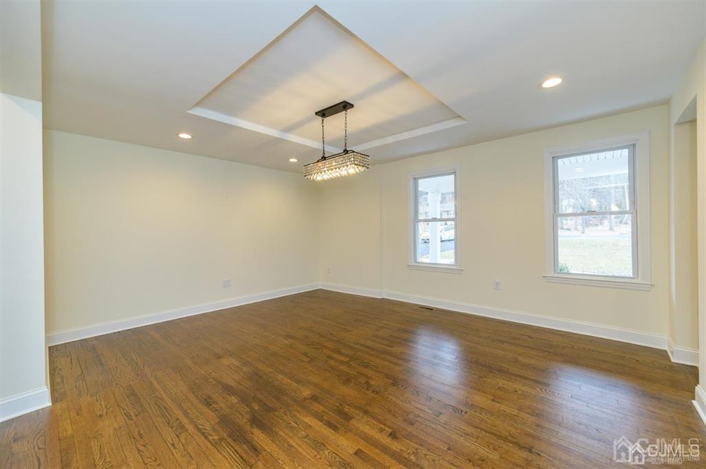 11 Little Philadelphia Road Washington, NJ 07882 - Photo 9 of 48 wooden floor in an empty room with a window