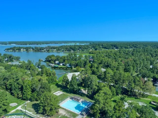 a view of lake with green space