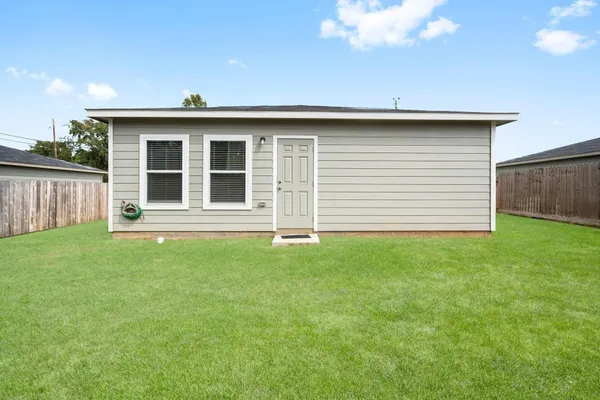 a view of a backyard with a garden