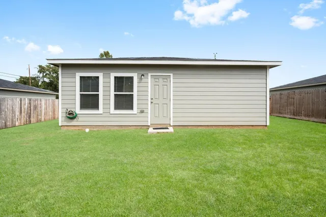 a view of a backyard with a garden