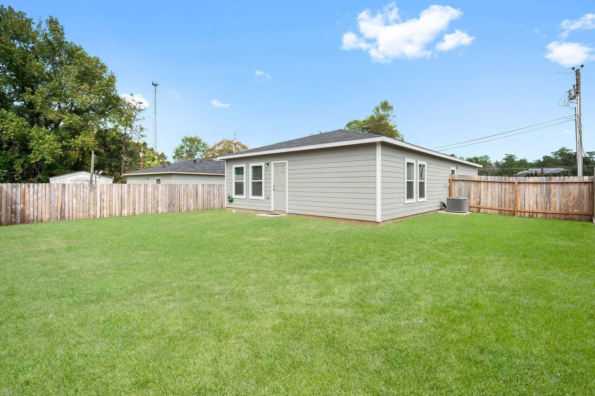 175 Mesquite Livingston, TX 77351 - Photo 4 of 14 a view of a house with a backyard