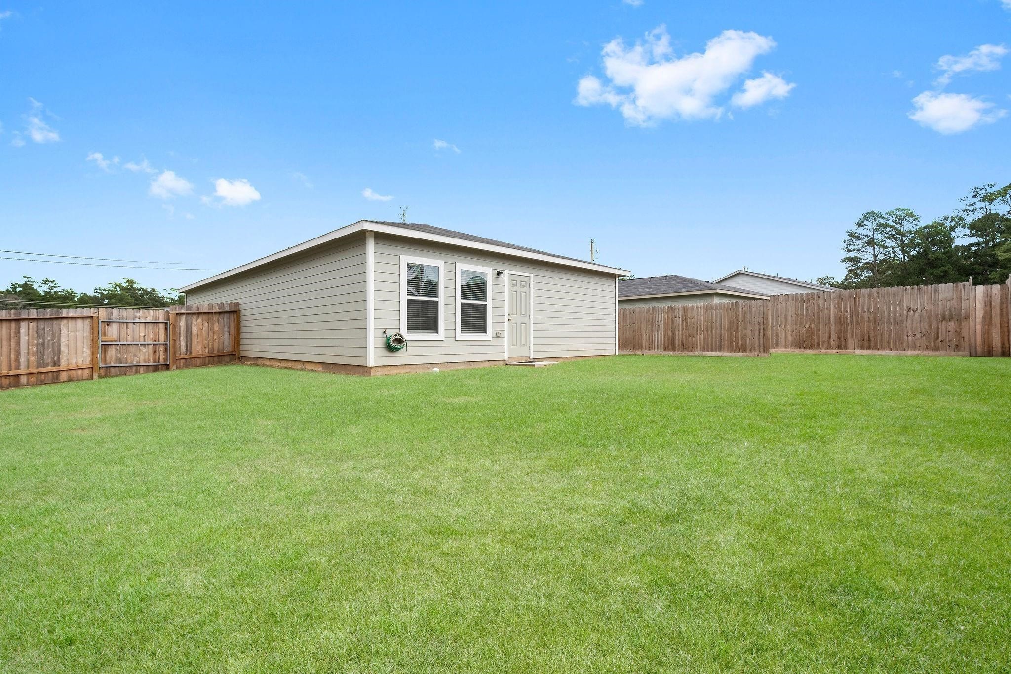 175 Mesquite Livingston, TX 77351 - Photo 5 of 14 a view of a house with a backyard