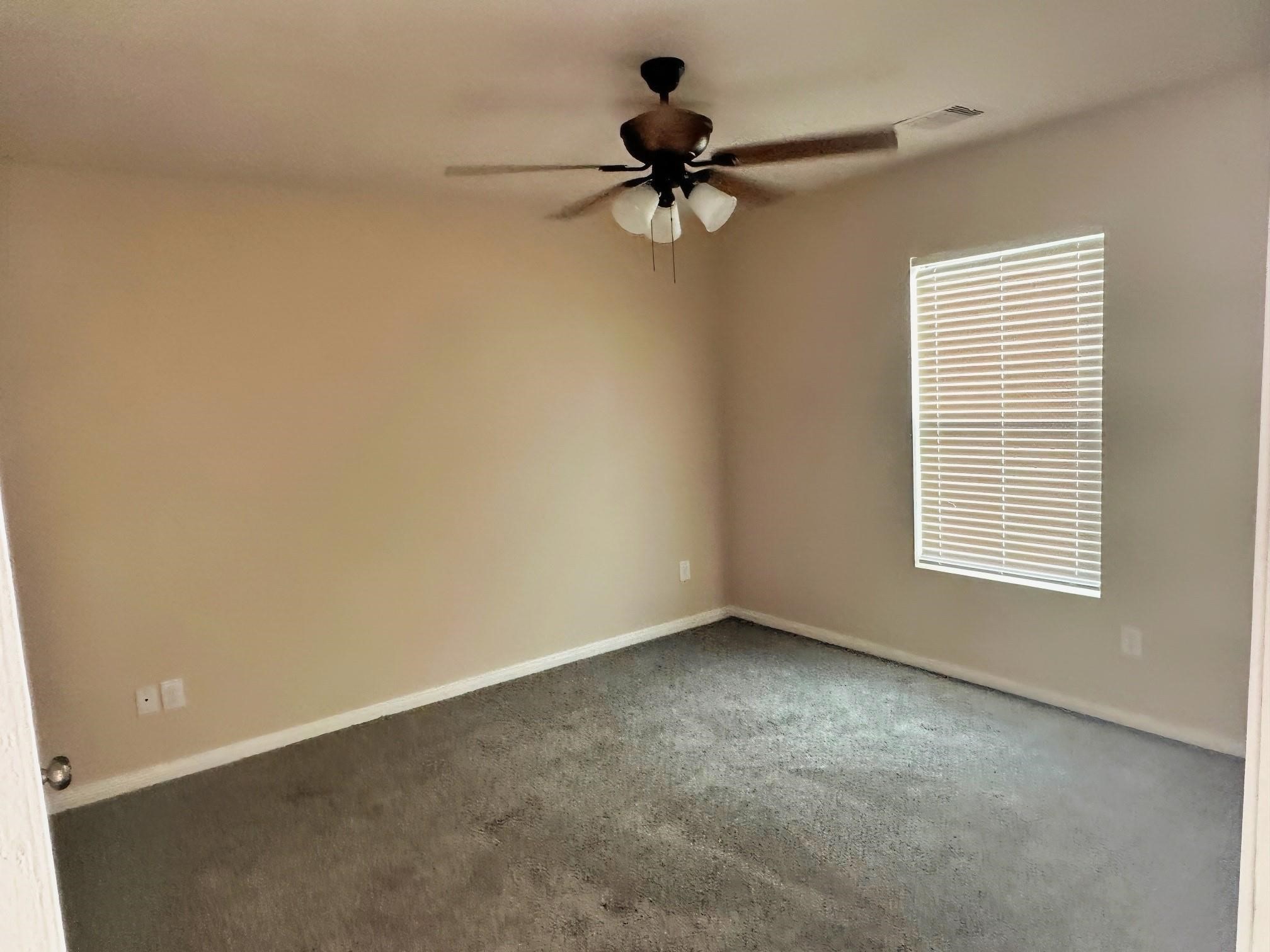 175 Mesquite Livingston, TX 77351 - Photo 8 of 14 a view of an empty room with a window