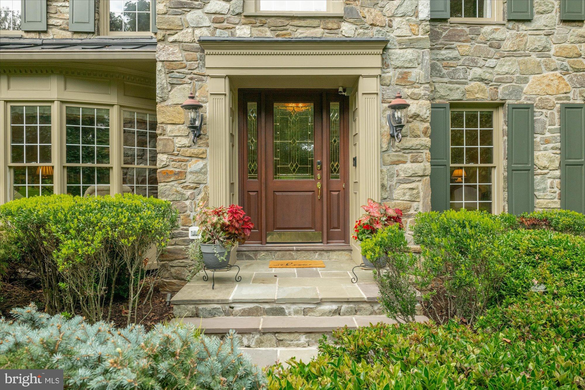 11308 Stonehouse Place Sterling, VA 20165 - Photo 6 of 76 Flagstone Hardscaping Leading to Elegant Entryway