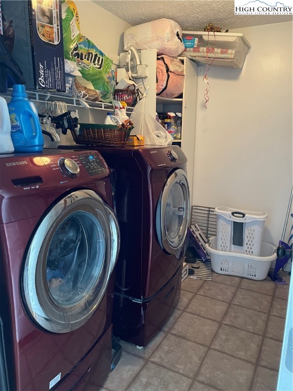 298 Russelton Road Boone, NC 28607 - Photo 11 of 28 a utility room with dryer and washer