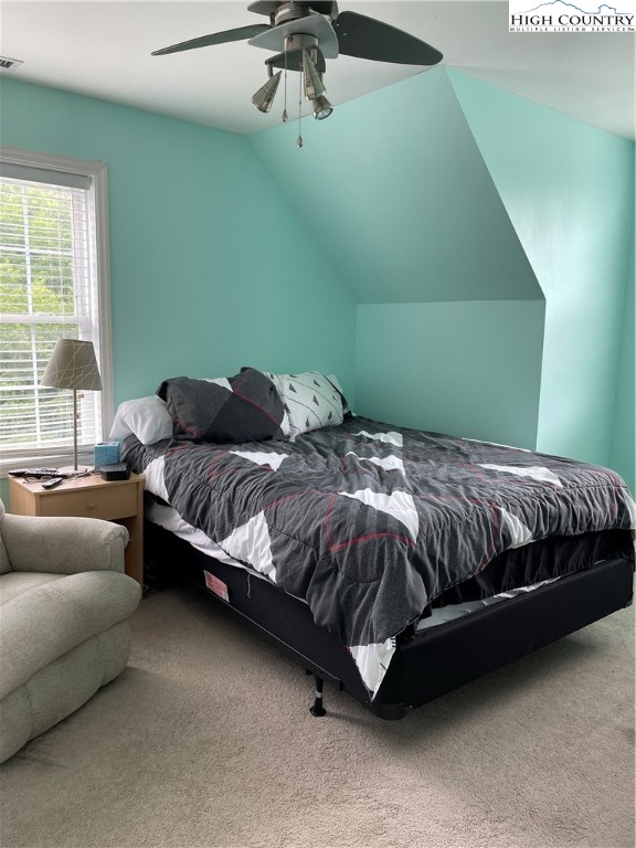 298 Russelton Road Boone, NC 28607 - Photo 15 of 28 a bedroom with a bed and window