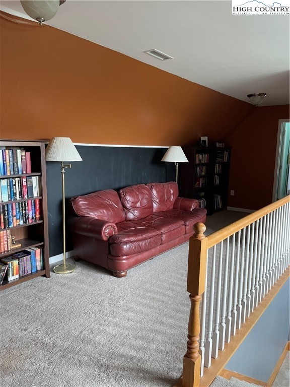 298 Russelton Road Boone, NC 28607 - Photo 17 of 28 a bedroom with furniture and a book shelf
