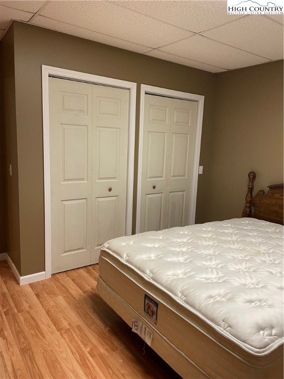 298 Russelton Road Boone, NC 28607 - Photo 21 of 28 a bedroom with a bed and cabinet