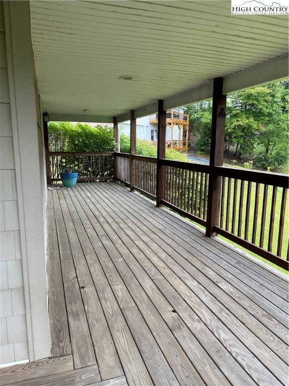 298 Russelton Road Boone, NC 28607 - Photo 25 of 28 a view of balcony with wooden floor