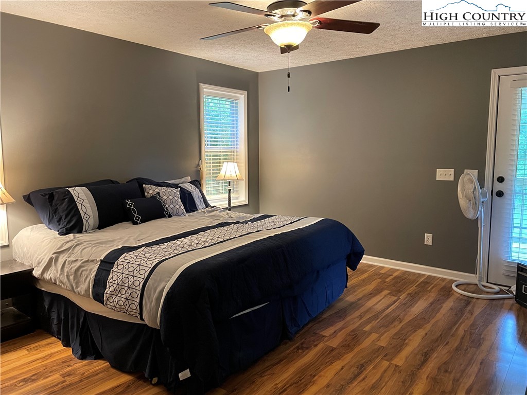 298 Russelton Road Boone, NC 28607 - Photo 8 of 28 a bedroom with a bed and window