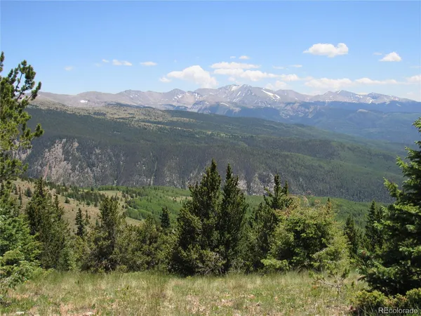a view of a lake with a mountain in the background