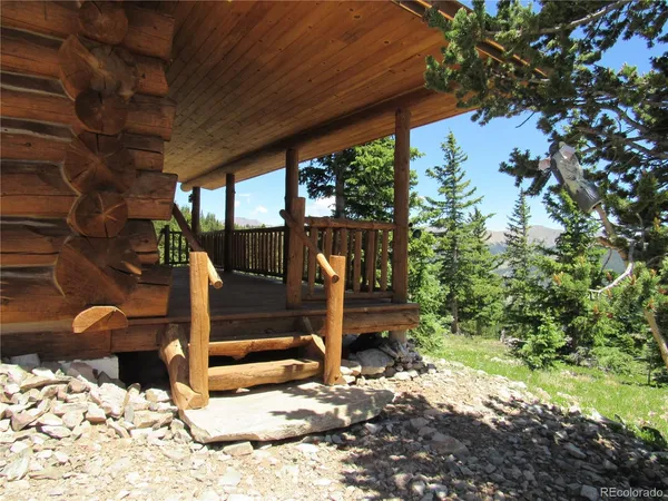 a view of a porch with a bench
