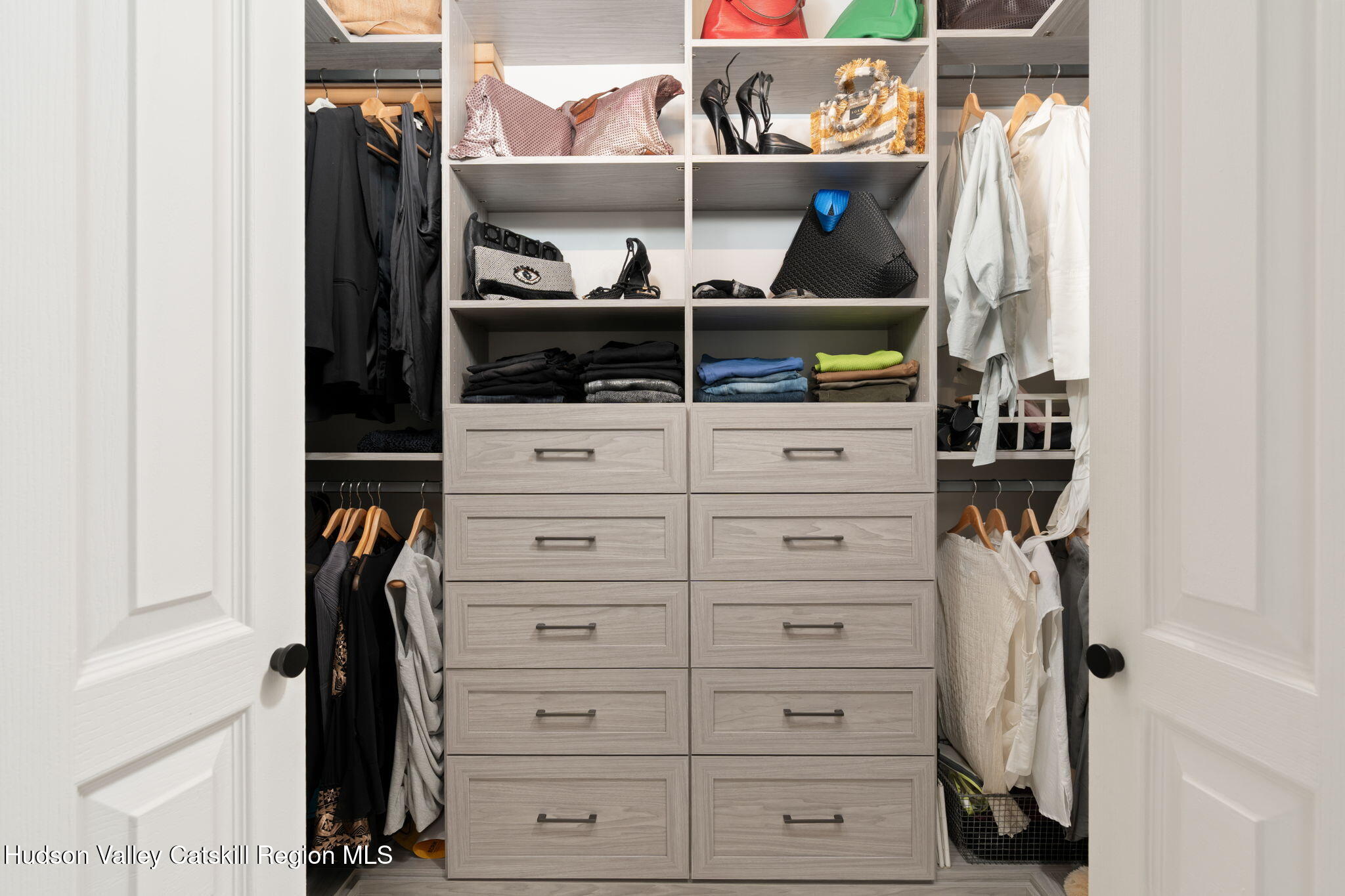 15 Oakes Road Highland, NY 12528 - Photo 23 of 48 a view of walk in closet with clothes and shoes