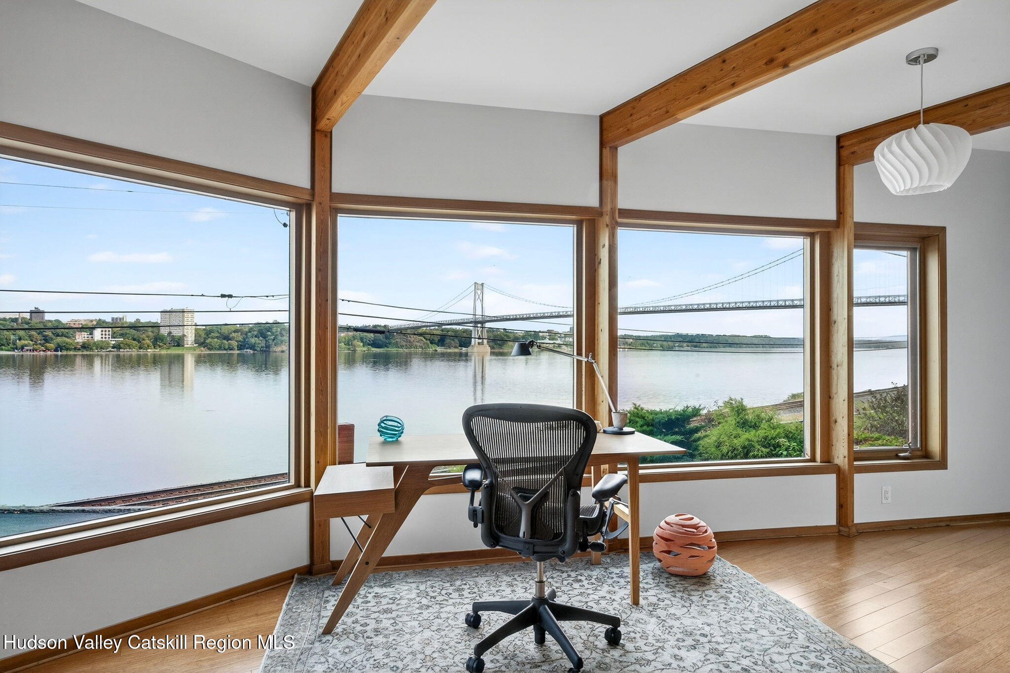 15 Oakes Road Highland, NY 12528 - Photo 27 of 48 a living room with a table and a large window