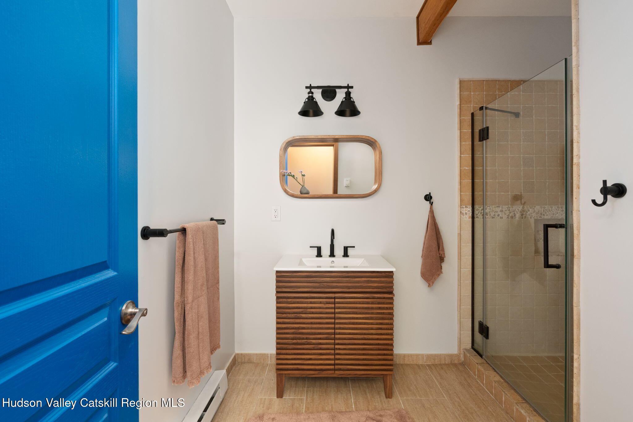 15 Oakes Road Highland, NY 12528 - Photo 34 of 48 a bathroom with a sink and a mirror