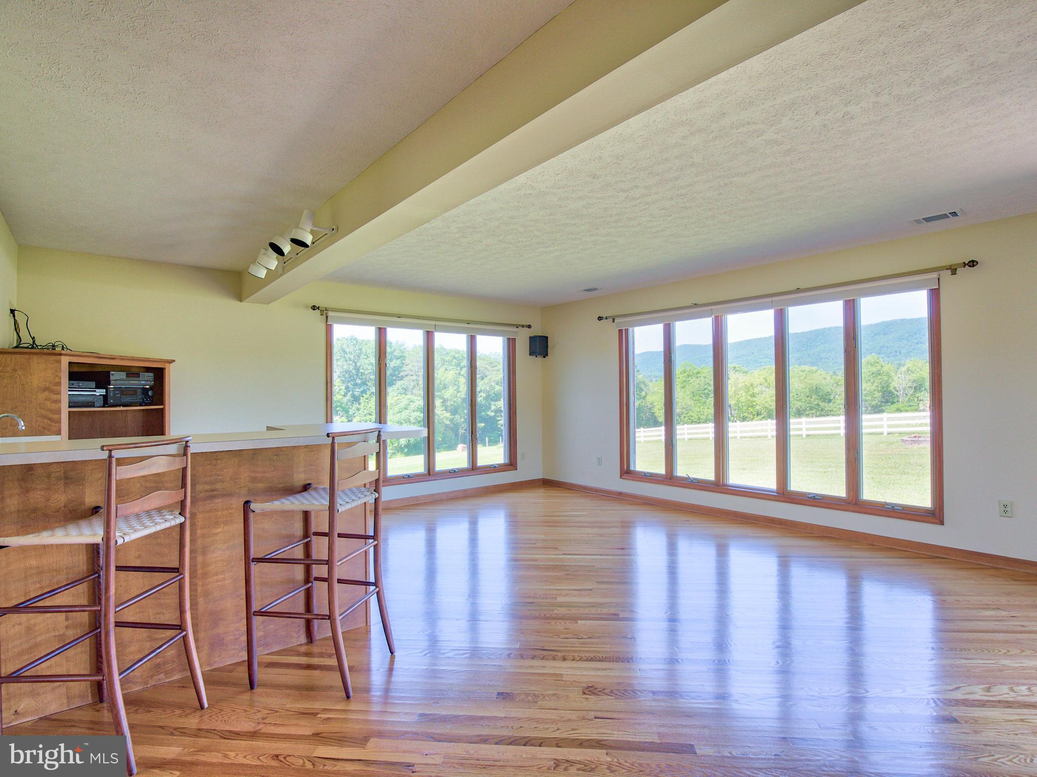210 Hanging Tree Road Winchester, VA 22603 - Photo 17 of 50 Huge windows all around Family Room=Gorgeous views