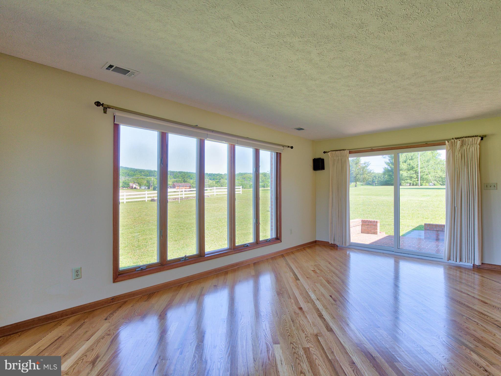 210 Hanging Tree Road Winchester, VA 22603 - Photo 19 of 50 Large glass doors to rear brick patio
