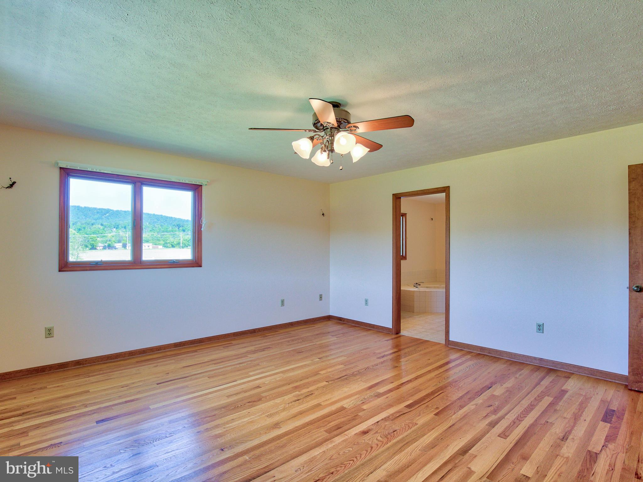 210 Hanging Tree Road Winchester, VA 22603 - Photo 23 of 50 Gleaming hardwoods in the Master Suite