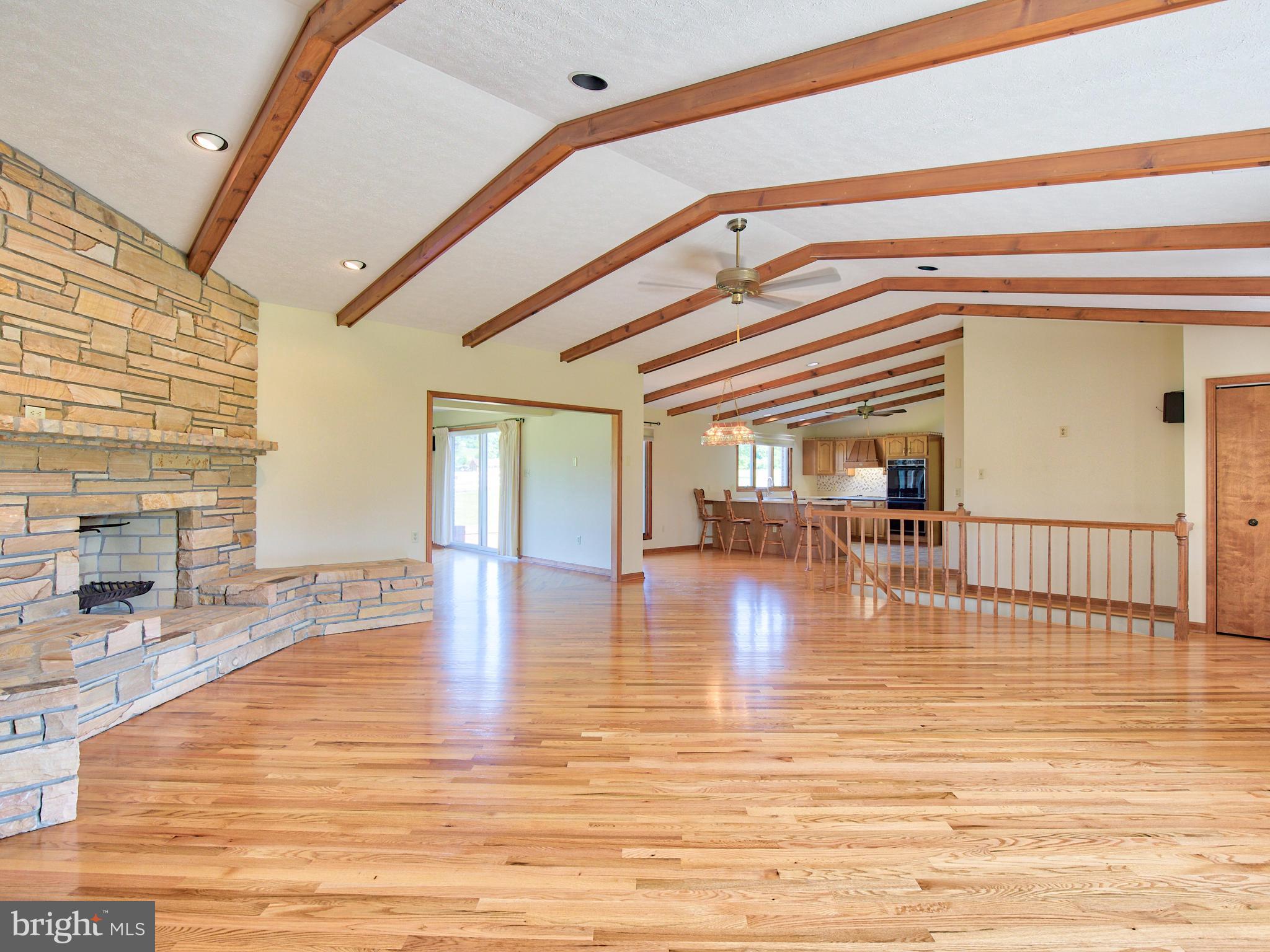 210 Hanging Tree Road Winchester, VA 22603 - Photo 6 of 50 Cathedral Ceilings & Wood Beams =Contemporary vibe