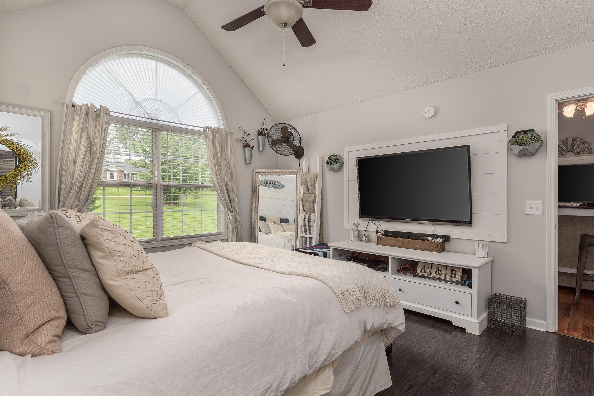 2964 Riley Creek Road Normandy, TN 37360 - Photo 9 of 18 a bedroom with a bed and a flat screen tv