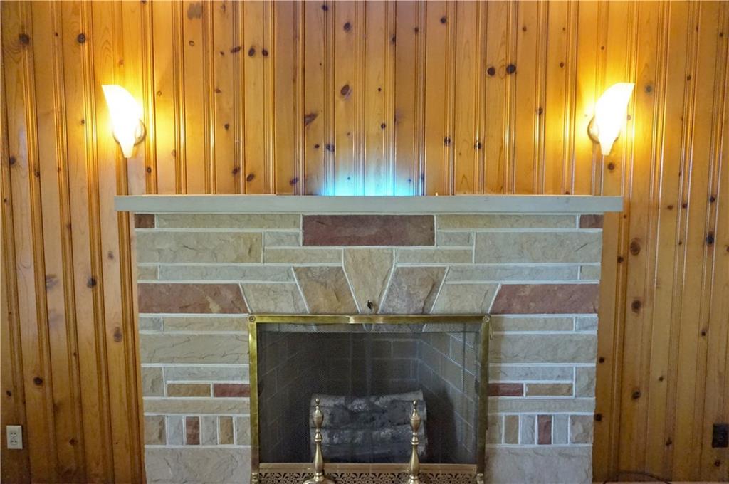 273 Bonniebrook Road Butler, PA 16002 - Photo 14 of 25 There is a light in the center of the fireplace mantel, adding to the charm of this home!
