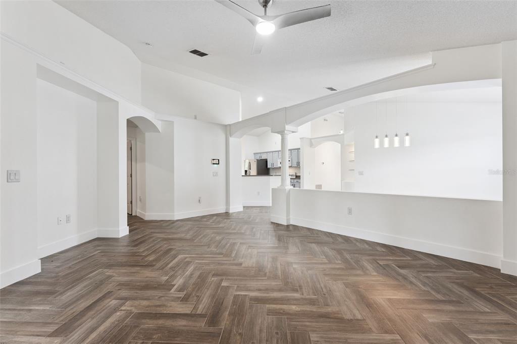 655 Eagle Pointe South Kissimmee, FL 34746 - Photo 13 of 49 a view of a livingroom with a kitchen