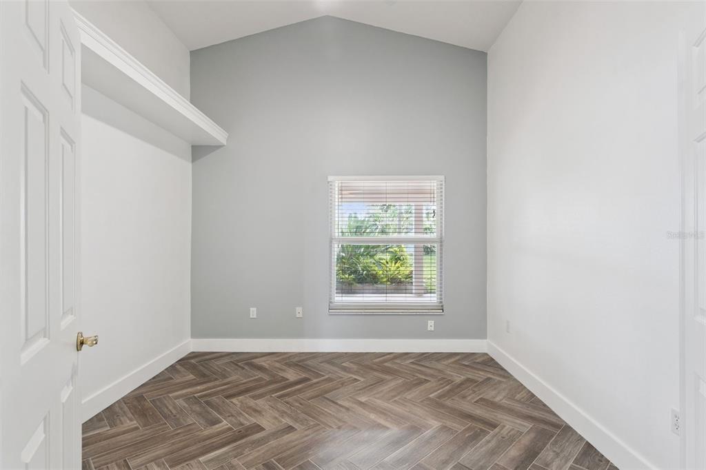 655 Eagle Pointe South Kissimmee, FL 34746 - Photo 19 of 49 an empty room with a window