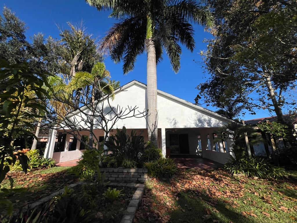 655 Eagle Pointe South Kissimmee, FL 34746 - Photo 34 of 49 a view of a house with a yard