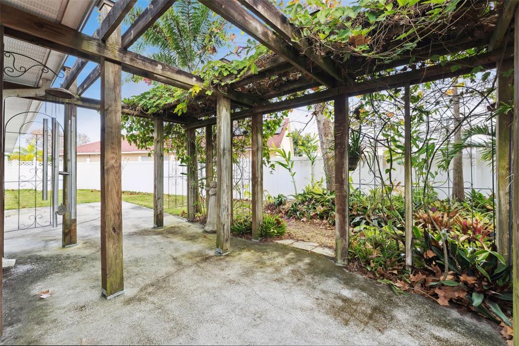 655 Eagle Pointe South Kissimmee, FL 34746 - Photo 41 of 49 a view of a porch with a backyard