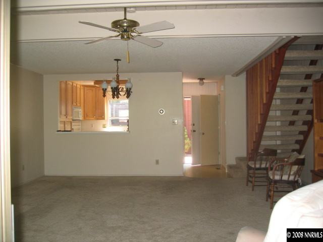 1917 South Villa Way Reno, NV 89509 - Photo 5 of 9 a view of a livingroom with a ceiling fan and window
